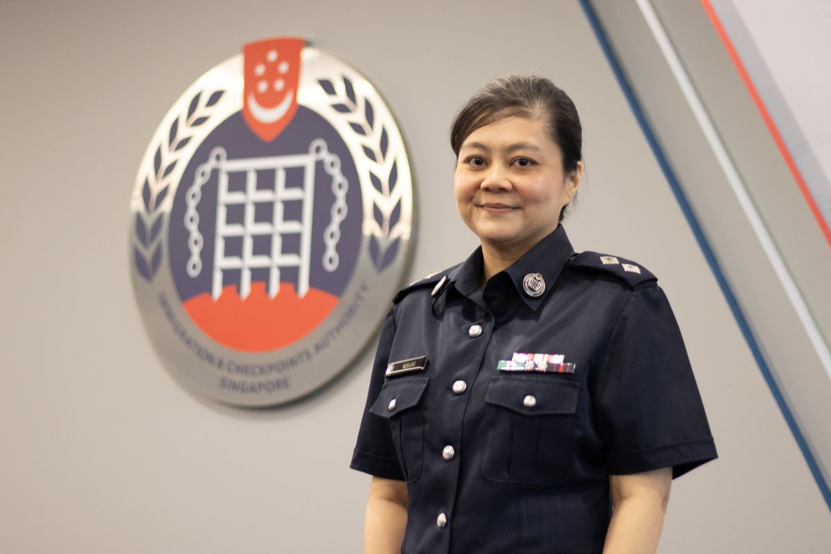 Inspector Nuraini smiling